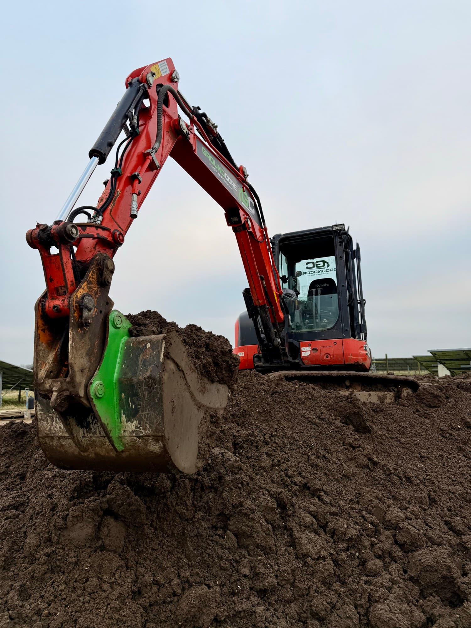An excavator working on a groundworks site